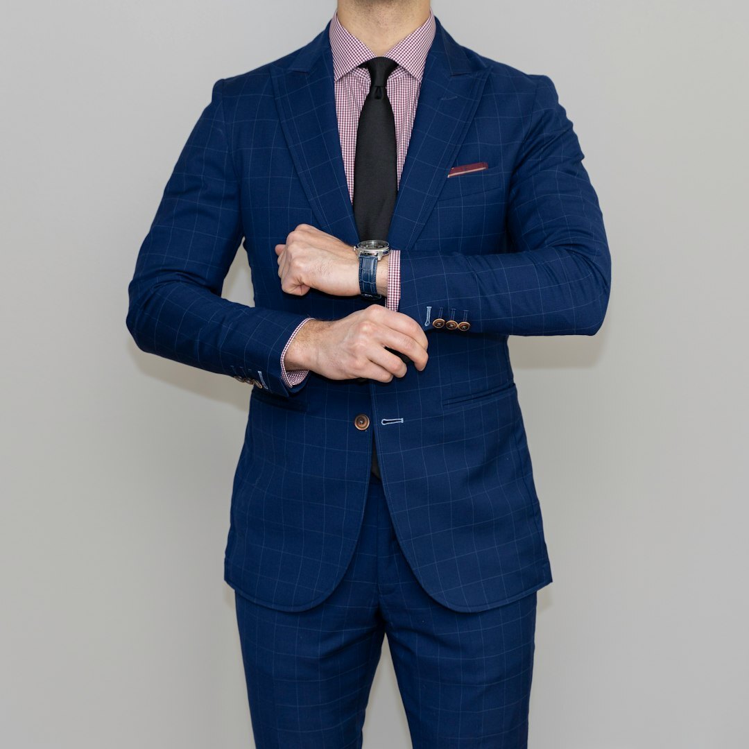 Professional man in suit with arms crossed