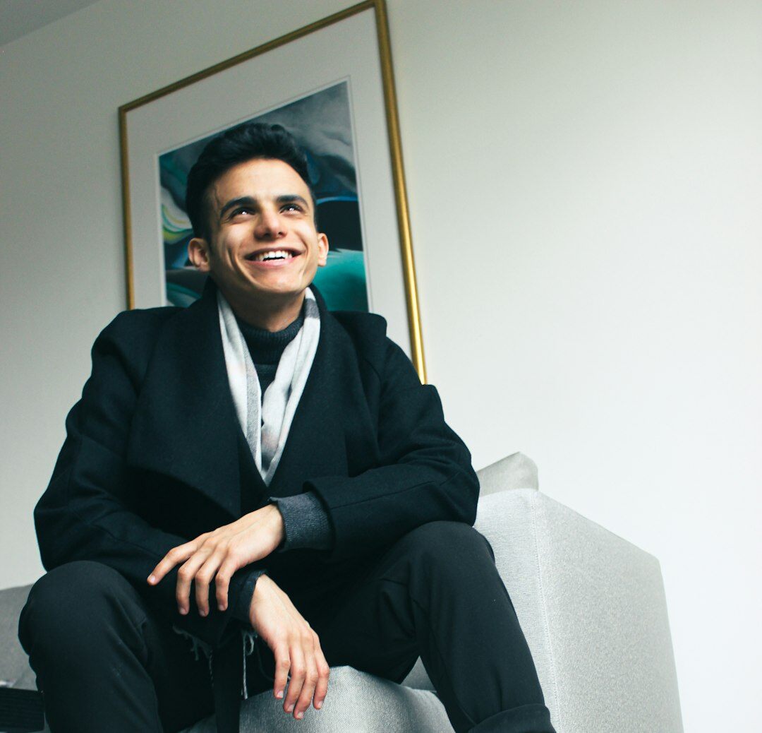 Professional man in business attire smiling at camera